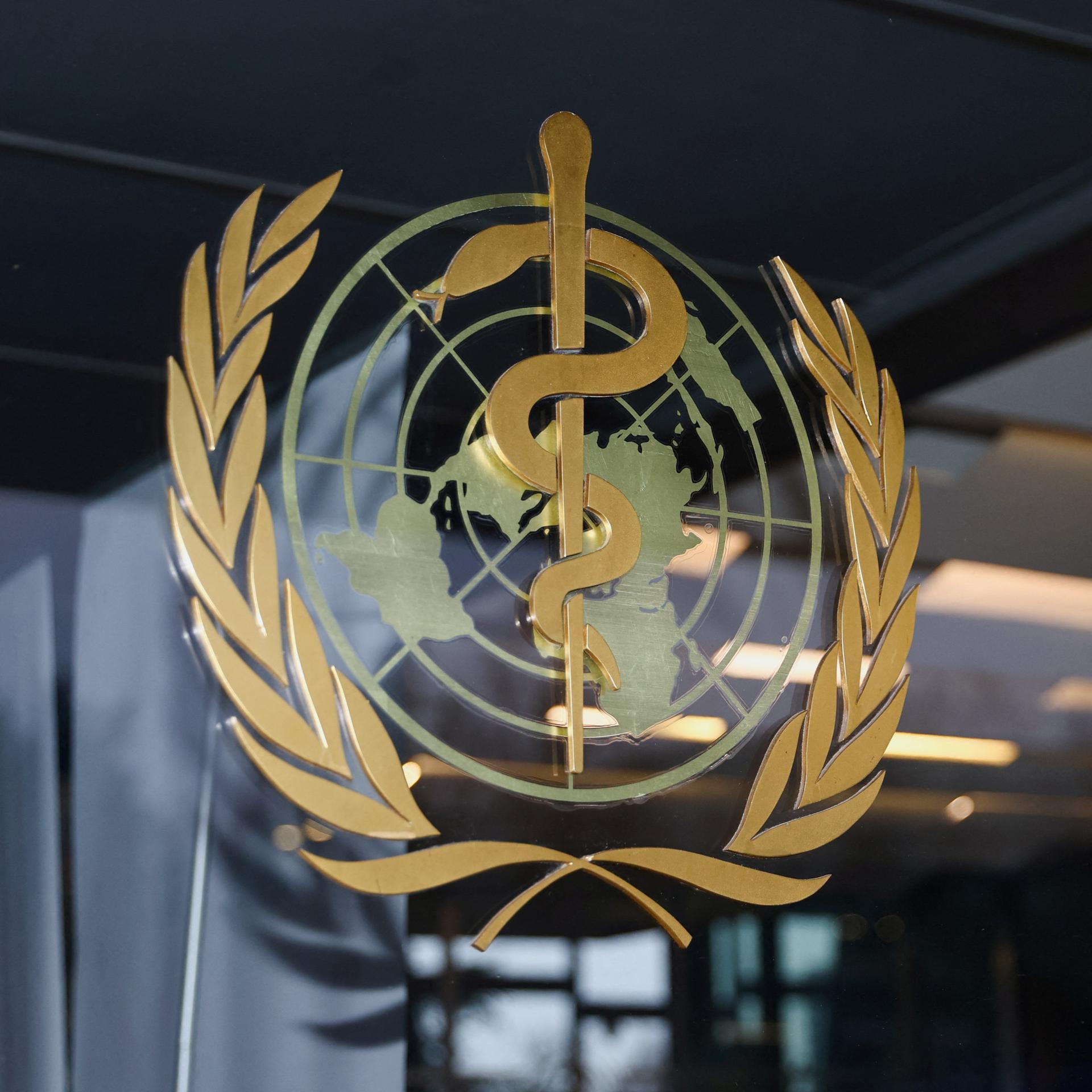 The World Health Organization (WHO) logo is pictured at the entrance of the WHO building, in Geneva, Switzerland, on December 20, 2021.