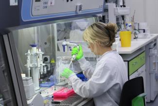 An employee of BioNTtech works at the ''Area 100 R&D'' research laboratory, in Mainz, Germany, on July 27, 2023. 